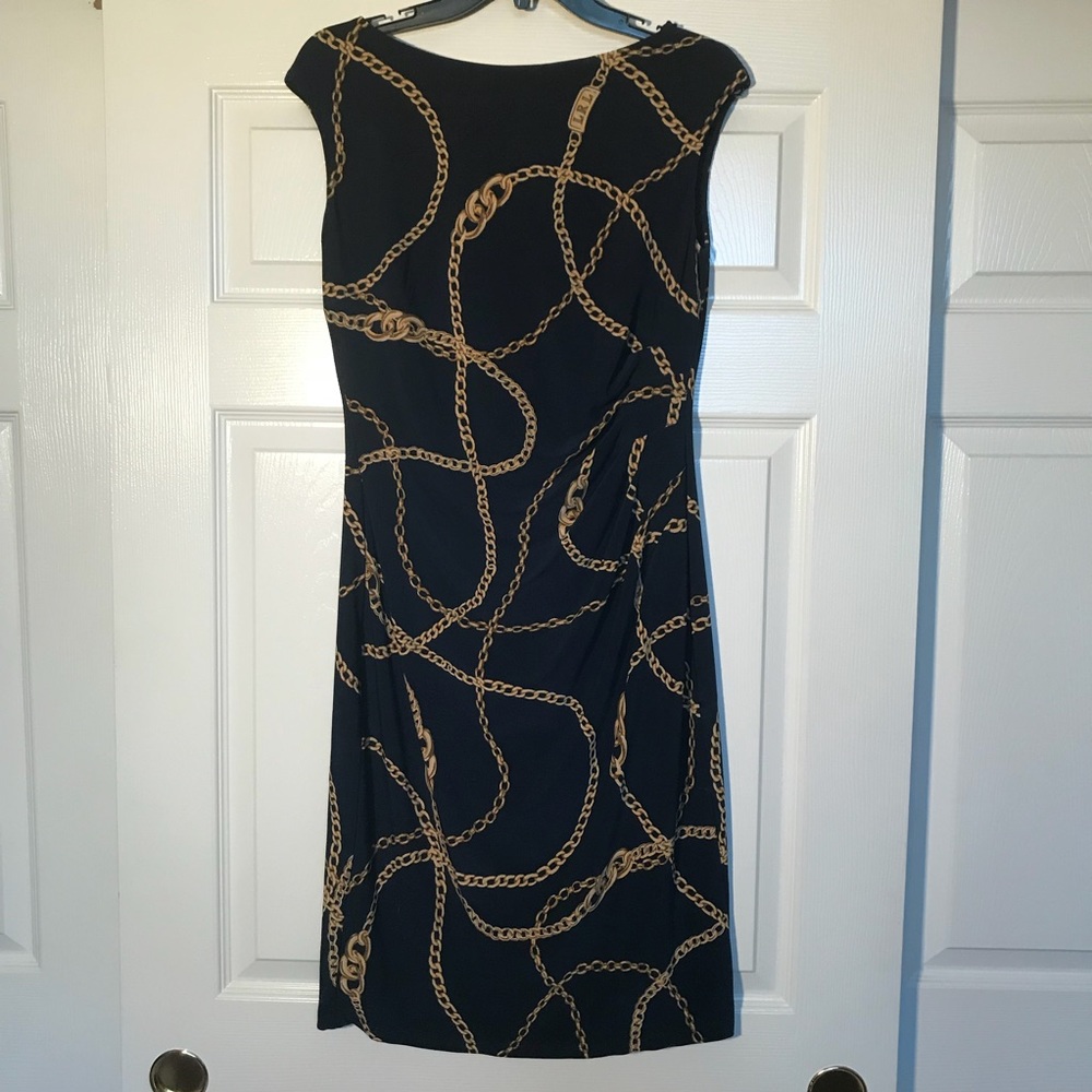 Form fitting black sheath-works both day and eve.